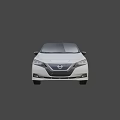 Nissan Leaf White Electric Car With Sleek Exterior Design And Alloy Wheels