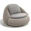 Modern Woven Lounge Chair with Curved Shape and Neutral Tones for Comfortable Relaxation