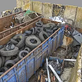 Recyclable Waste Materials In Bins With Tires Wooden Boxes And Metal Scraps