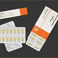 Acetaminophen Caffeine Tablets In Open Orange And White Box Packaging