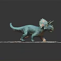 Teal Triceratops Dinosaur Model Featuring Pink Frill Standing On Rocky Base Design