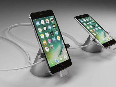 Two Smartphones Charging on Stands with Cables and App Icons Displayed 3d model
