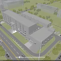 Modern Industrial Factory Complex With Surrounding Greenery Roads Vehicles And Parking Area