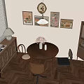 Cozy Dining Space With Stylish Wall Lamp Round Table And Decorative Wall Art