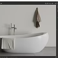 White Freestanding Bathtub With Faucet Towel And Hanging Towel In Modern Bathroom