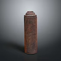 Rusted Cylindrical Metal Container With Domed Lid On Dark Background