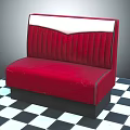 Red Upholstered Sofa With White Backrest And Tufted Design On Black And White Checkered Floor