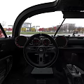 Red Sports Car With Black Roof Sleek Aerodynamic Body And Large Wheels