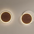 Modern Round Wall Lamps With Wooden Panels And Illuminated Frames On Light Wall