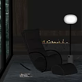 Black Leather Lounge Chair In Modern Living Room With Floor Lamp And Fireplace