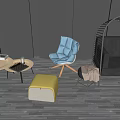 Blue Fabric Single Sofa With Black Rattan Chair Small Coffee Table Yellow Ottoman And Wooden Floor