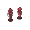 Two red fire hydrants with metal chains serving as outdoor public safety equipment
