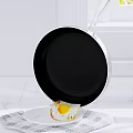 Sunny Side Up Fried Egg on White Plate with Frying Pan and Marble Countertop