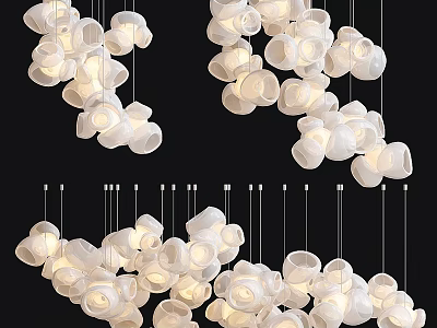 Multiple Modern White Flower Shaped Chandeliers Hanging In Interior Space 3d model