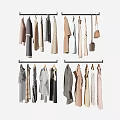 Variety of Fashionable Clothes Hanging on Metal Hangers with Various Styles and Colors