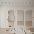 Stylish Mirrors in Various Shapes on White Wall with Circular Rug and Potted Plant