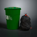 Green Trash Bin With Reuse Reduce Recycle Label And Black Garbage Bag