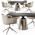 Light Colored Leisure Chairs With Metal Legs Around Modern Black Dining Table