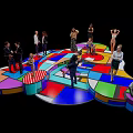 Vibrant Multicolored Art Installation With Geometric Platforms And People Interacting