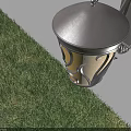 Outdoor Wall Light with Curved Metal Arm and Decorative Glass Illuminating White Wall Beside Green Grass
