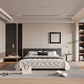 Modern Bedroom Interior With Quilted Bedspread Pillows Framed Artwork Area Rug And Wooden Flooring