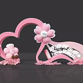 Romantic Floral Display With Pink Heart Shaped Arch Cartoon Doll And Petals