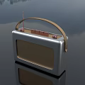 Portable Retro Style Radio with Silver Body Brown Handle and Antenna for Daily Use