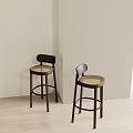 Two Black Bar Stools by Beige Wall on Wooden Floor 3d model