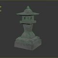 Traditional Japanese Stone Lantern With Carved Base And Pagoda Style Top Structure