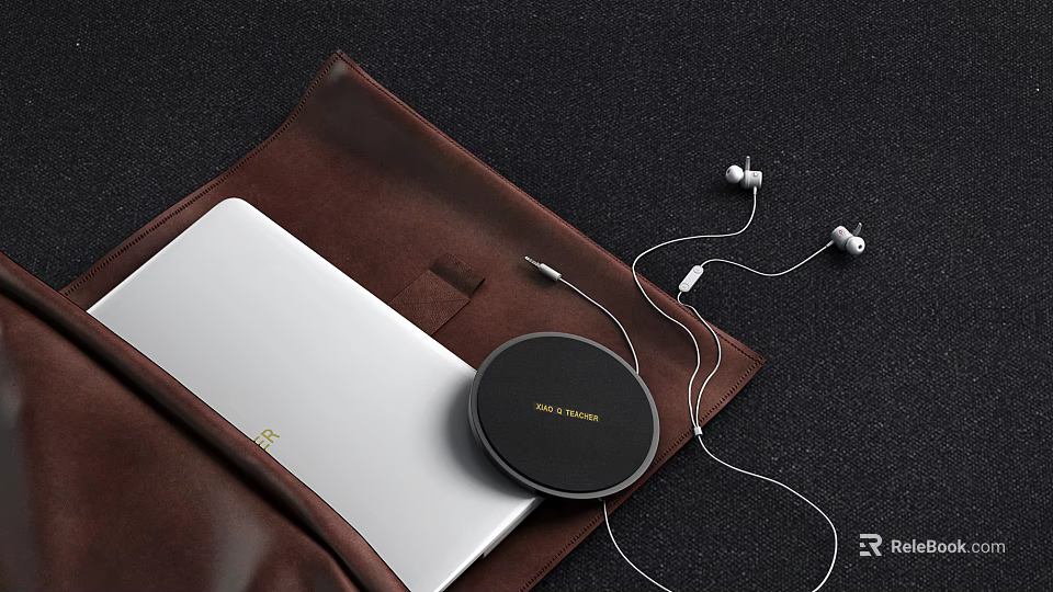 Portable Audio Accessories With Headphones Speaker And Laptop In Leather Case 3d model 
