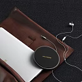 Portable Audio Accessories With Headphones Speaker And Laptop In Leather Case