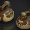 Handcrafted Sculpted Ceramic Vessels With Human Face And Geometric Patterns