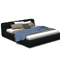 Modern Black Frame Double Bed With White Mattress Grey And Brown Pillows Blue Blanket