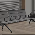 Modern Public Bench Featuring Light Gray Seats Black Metal Frame Armrests And Side Table