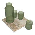 Green Striped Glass Cups with Matching Vase on Beige Stone Slab Tray