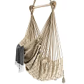 Woven Beige Hanging Chairs with Tassel Accents for Indoor Outdoor Spaces