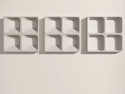 Three White Square Carved Decorations With Geometric Patterns On Light Wall 3d model