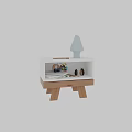 Modern White Bedside Table With Wooden Legs Featuring Decorative Tree Books Glasses And Colorful Pencils