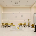 Bright Modern Dessert Shop Interior With Pastry Display Yellow Chairs And Pendant Lights