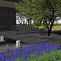 Serene Garden Landscape with Purple Flowers Trees Outdoor Seating and Wooden Flooring