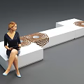 Yellow Modular Public Chair With Spiral Patterns For Urban Seating Spaces