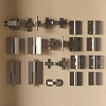Various Stainless Steel Hinges And Connectors Neatly Arranged In Wooden Drawer