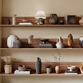 Natural Rustic Decorative Ornament Combination on Wooden Shelves with Vases Sculptures Books and Table Lamp