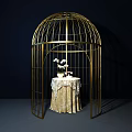 Elegant Golden Birdcage Interior With Lace Tablecloth And White Flowers