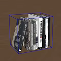 Neatly Stacked Books and Magazines on Wooden Floor with Varied Covers
