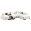 Modern Sectional Sofa Set With Grey White Upholstery Pillows Blankets And Ottoman