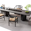Modern Tea Table and Chairs with Wooden Surface Tea Set and Green Plant