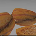 Fresh Cocoa Pods with Striped Yellow and Pink Skin and Halved Showing Inner Texture