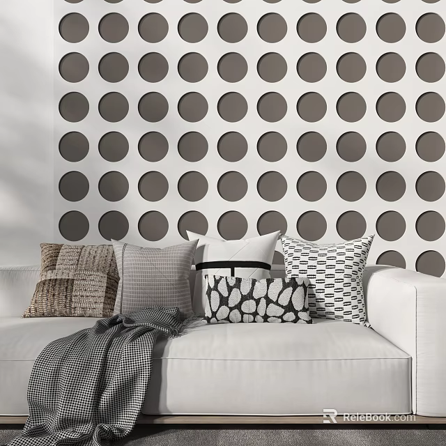 Modern Throw Pillows on White Sofa Against Gray Polka Dot Wall with Diverse Patterns 3d model