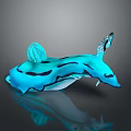 Blue Sea Slug With Black Stripes and Tentacle Like Structures on Gray Background With Reflection